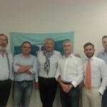 amoroso insieme ad alcuni cooperatori