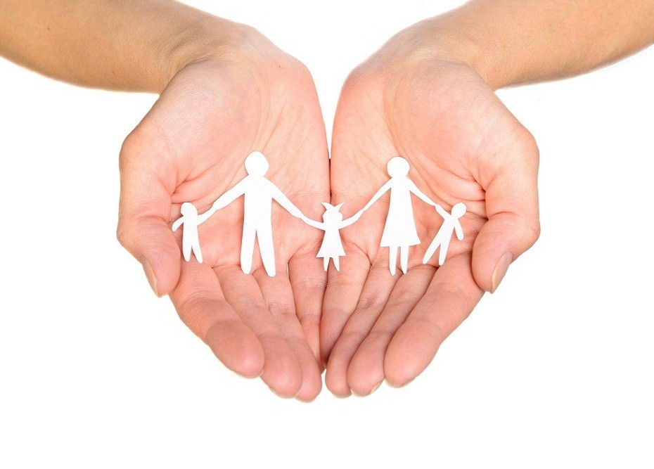 Paper family in hands