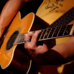 acoustic guitar performance by music band