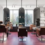 Chairs and mirrors in modern hairdressing, beauty salon