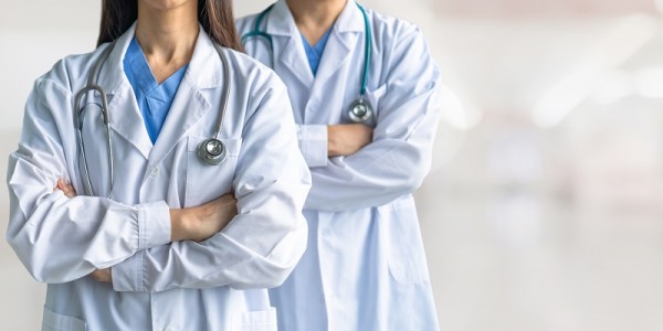 Surgeon and anesthetist doctor ER surgical team with medical clinic room background for emergency nursing care professional teamwork and patient trust in ICU hospital's hospitality concept